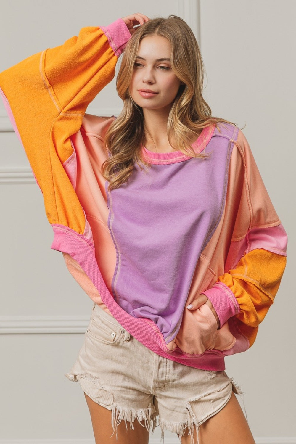 BiBi Color Block Exposed Seam Sweatshirt with Pockets Sweatshirt Trendsi   