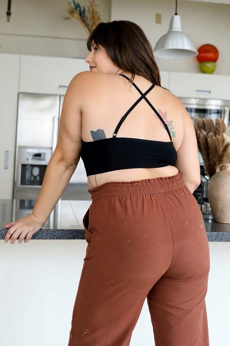 Elegant black plus size high neck lace crochet bralette style.