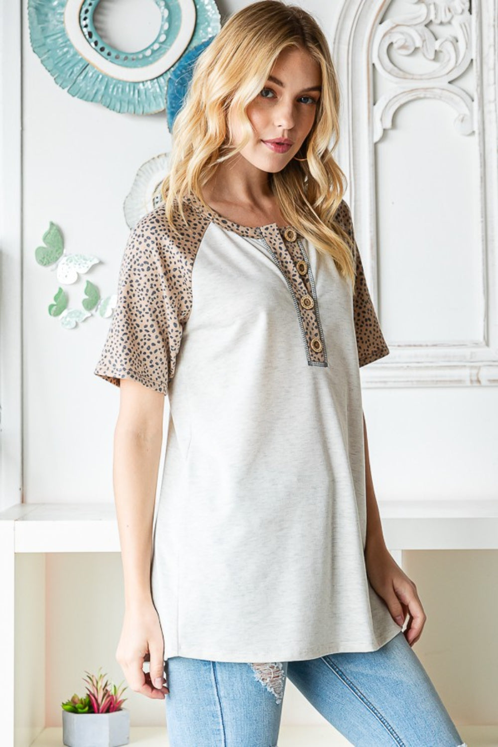 Heimish Full Size Animal Print Half Button Short Sleeve Top - NeoKira Unlimited